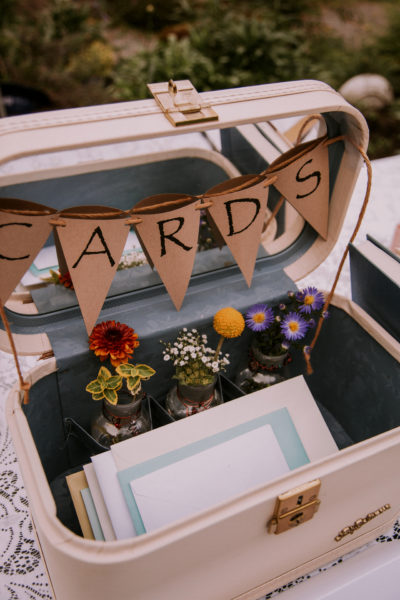 cream colored suitcase to hold wedding giftcards
